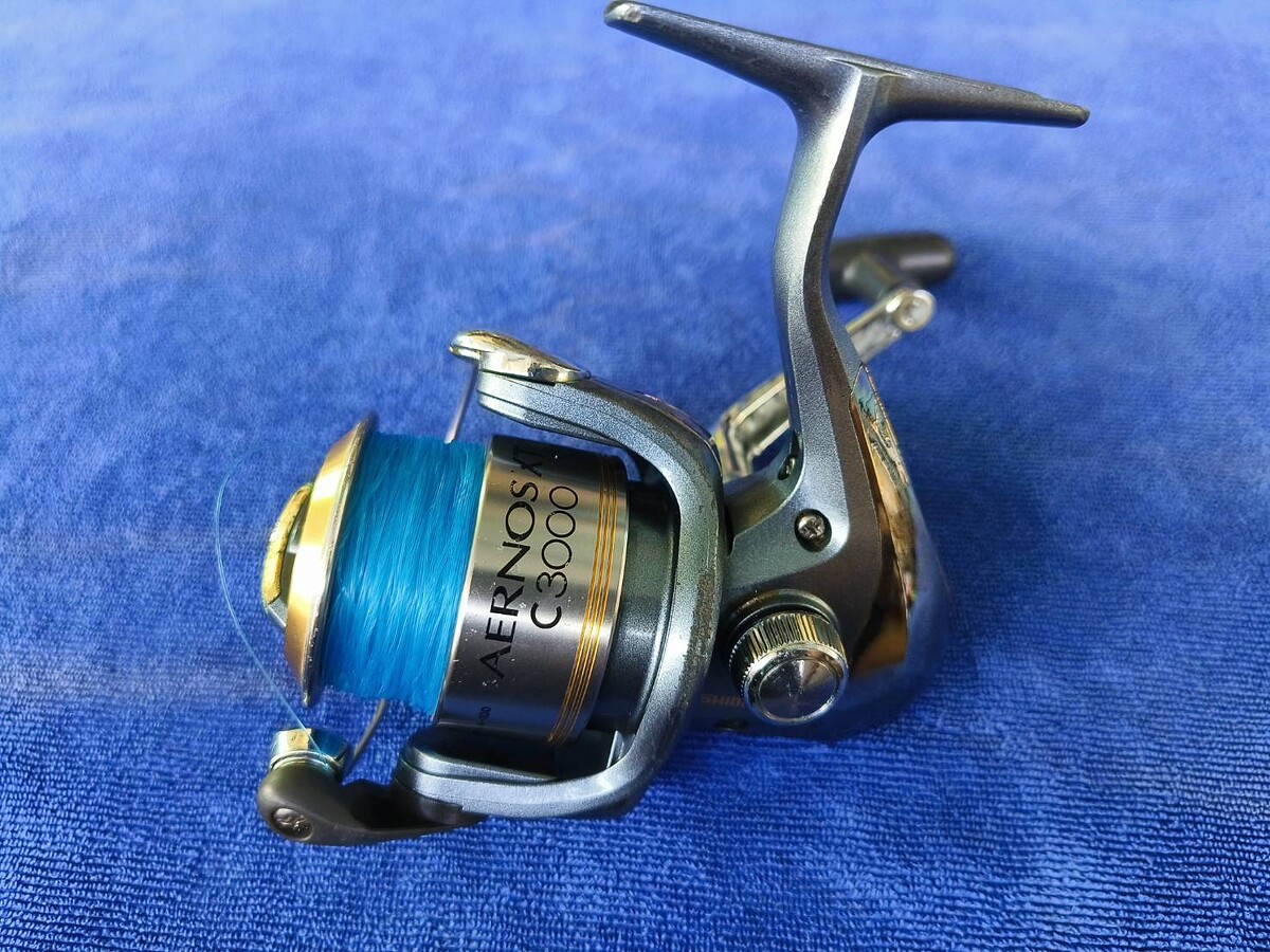 รอกสปิน  SHIMANO   AERNOS     XT    C3000   มือสองญี่ปุ่น