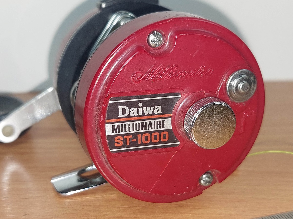   Dum fishing   # 8    *****    DAIWA   MILLIONAIRE    ST - 1000        *****