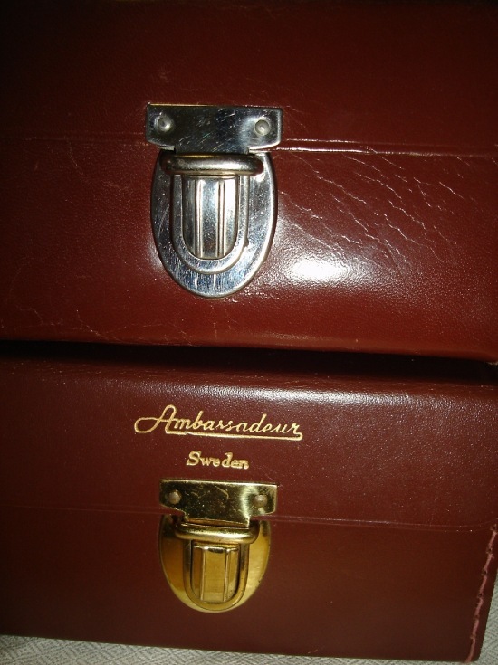 The top one is Record Ambassadeur original brown leather case with early chrome locking latch.