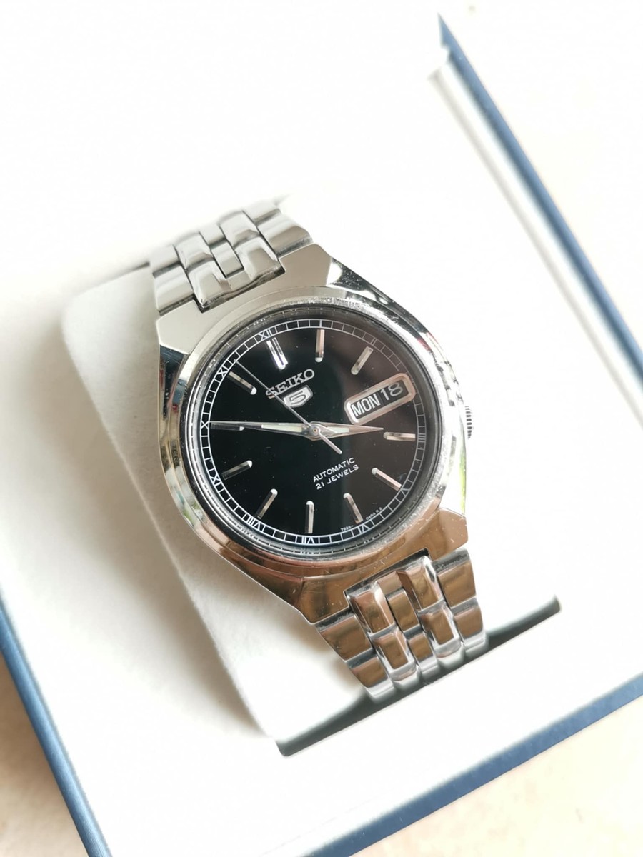 นาฬิกา Seiko 5​ ​ Automatic​ กลไกลระบบเครื่อง 7s26 หน้าดำหลักแท่งเงิน ของแท้