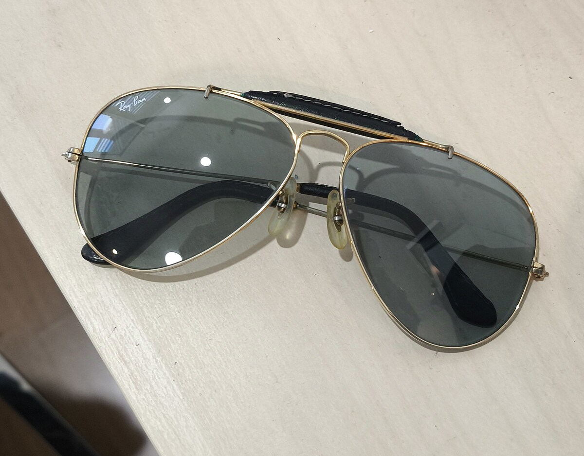 Rayban B&L USA 58 aviator เลนส์auto เปลี่ยนสีตอนออกแดดเป็นเลนส์กันแดดครับ