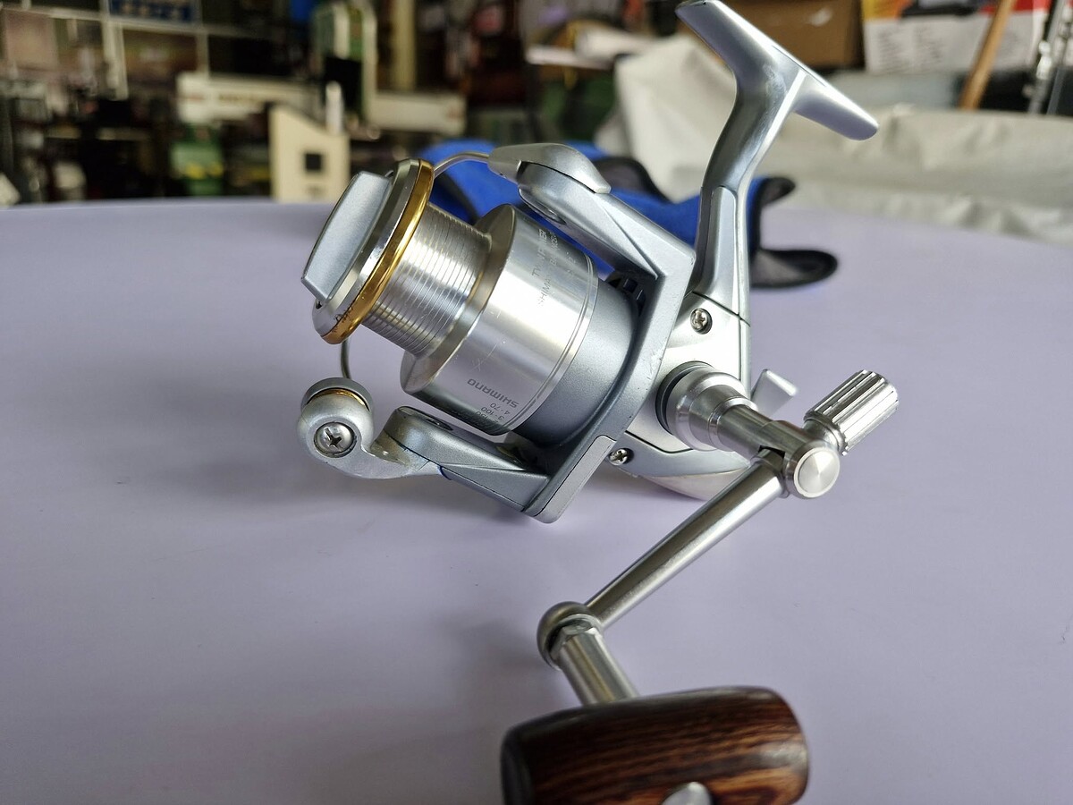 รอกสปิน SIHMANO Twin power 2000 แขนโรบอต วินเทรด