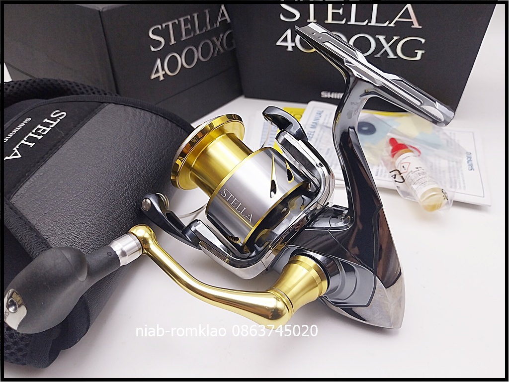 [b][q]Shimano Stella 4000XG ปี2014 สภาพสวย มีรอยไม่มาก ฝรั่งเจ้าของเดิมบอกใช้งาน้อยและใช้น้ำจืดอย่าง